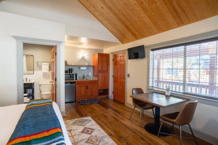 The cabin's kitchenette and table for two