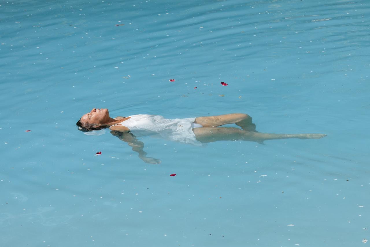 Lying in stillness during a sound ceremony with Radiant Flo